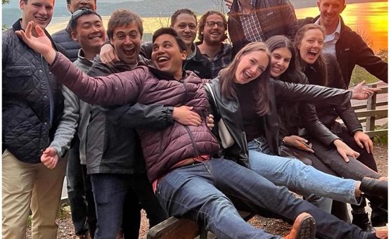 Classmates taking a fun photo in the sunset on our last night in Norway