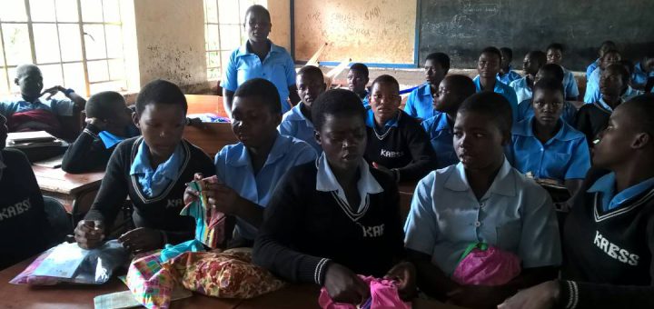 Kenswed Organization, young students in a classroom setting with teacher